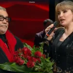 Mariotto regala un fascio di rose a Milly Carlucci e torna a Ballando